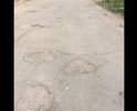 Разбитая дорога по которой машина ни едет , а ходит