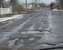 Дорога вся в выбоинах и ямах залитых водой