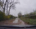 Просим отремонтировать и привести в надлежавшее состояние данную улицу, т.к. передвигаться по ней пешеходам, а часть них это школьники и родственники больных и рожениц города Острова без резиновых сапог затруднительно.