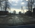 На данном участке расположена конечная остановка автобусного маршрута, асфальтового покрытия нет. Сам участок дороги в канавах, даже ямами не назвать.