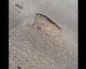 Ни одна фотография не способна передать ненависть автомобилистов города Каспийска к этой дороге. Она еще в центре города, очень нагруженная , там же администрация рядом, яркий пример плевка чиновников в лицо водителей