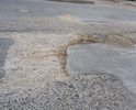 Ужасная дорога, очень нагруженная , рядом воинская часть , большой поток, эти ямы дорожники закидали песком