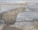 Ужасная дорога, очень нагруженная , рядом воинская часть , большой поток, эти ямы дорожники закидали песком