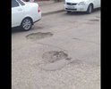 Дорога протяженностью 250м испещрена ямами разной глубины, машины, особенно в дождливую погоду не замечают ям и машины проваливаются. Одна из ям глубокая, глубина ее составляет больше 40 см
