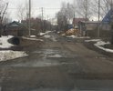 Очень много лет назад перестали обслуживать дорожное полотно, асфальт начал приходить в негодность, люди большие ямы латают битым шифером.