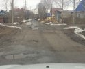 Очень много лет назад перестали обслуживать дорожное полотно, асфальт начал приходить в негодность, люди большие ямы латают битым шифером.