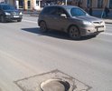На проспекте Ленина (напротив Департамент транспорта, дорожной деятельности Томской области) люке отсутствует крышка (сам он засыпан) образовалось препятствие.
