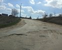 Это наш "замечательный" малый мост. Давным-давно там была отличная дорога, по которой было приятно ездить. Не текущий момент от дороги практически ничего не осталось. Дорожное полотно усыпано ямами разных размеров, которые порой приходится объезжать по обочине.