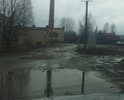 Большой жилой район, во дворах творится полнейший мрак круглогодично. Местами торчит арматура, лужи скрывающие пол колеса легкового автомобиля. Пешеходных тротуаров нет вообще.