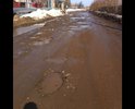дорога ведущая на площадку РТС пришла в негодность, тротуар отсутствует, передвигаться на а/м можно не больше 5 км/ч