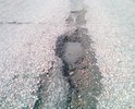 Дорога капитально не ремонтировалась с момента ее постройки в 2001 году, чуть только подлатали, но это никак не решает проблему.