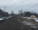 На данном участке ехать более 15 км в час не получается, страшно, что машину может выкинуть с дороги. Местами виднеются куски асфальта, значит он тут был. Дорога требует ремонта.
