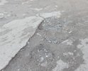 Дорога, проходящая вдоль дома по ул. 60-летия Октября 24 с такими глубокими ямами, что водители, после дождя, не зная глубины ям, "оставляют бамперы". Пройти пешком, не говоря уже о коляске с ребёнком - просто невозможно, а в дождь даже в сапогах не проплыть!!!