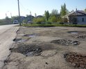 Водителям самим приходится ремонтировать дорожное покрытие! Это съезд на заправку ТНК!