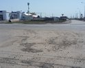 Дорога в некачественном состоянии. Был произведён некачественный ямочный ремонт, после первых осадков ямы открылись вновь