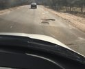 Дороги просто нет. Много аварийных ситуаций так как проехать по яме размером в пол метра невозможно,приходиться объезжать по встречке. В две стороны такая ситуация.