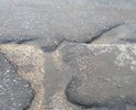 Проезд убитый. Покрытие не ремонтировалось более 10 лет