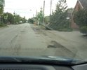 Дорога неровная, состоит из некачественных заплаток и ям. Необходим капитальный ремонт, вместо которого делается очередная попытка "выборочного" ямочного ремонта
