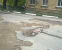 Дорога по улице Циолковского интенсивно используется, но мало пригодна для движения. Полностью покрыта ямами.После каждого дождя ямы становятся все больше и больше.