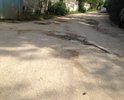 Дорога по ул.Каштановая г.Севастополь никогда не подвергалась ремонту, и представляет опасность для местных жителей и водителей. Огромные глубокие ямы, продавленные люки и ливневые решетки