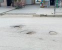 Очень глубокие выбоины, р-н Центрального Рынка пгт. Коктебель, летом обязательно вызовет заторы на трассе Феодосия-Ялта