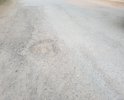 Выбоины и неровности на участке дороги по пер. Песочный, создает неудобства и трудности при движении автотранспорта