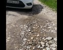 Друзья , добрый день. Почему то не могу добавить более одной фото . 
Указанная улица по документам в администрации уже 20 лет заасфальтирована - так мне рассказывал один знакомый. На самом деле после каждого дождя дорога превращается в траншеи , что существенно усложняет проезд автомобилей , транспорта мед служб и муниципальных служб. Это основной подъемдля более 50 дворов , особенно зимой .  Решить проблему можно лишь положив бетонные плиты. Кисловодск это город курорт , но увы за пределами основной улицы разруха полная. (См ул донская и Ольховская )