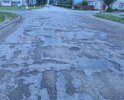 Это центр города. Дорога в ужасном состоянии.Четвёртый год подряд ямочный ремонт.
