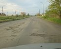 Переезды через трамвайные пути, и дорога от остановки Заводская до разворота на гаражах и обратно как после бомбежки.