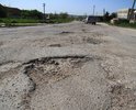 Абсолютно убитый участок дороги на село Константиновка ,Симферопольского района, практически все покрытие усеяно ямами,ямками,выбоинами. Ходит общественный транспорт, население 3 тысячи человек.