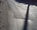 Мятый асфальт, ямы. Дорога состоит из одних латок, покрытие стремительно рассыпается. Не первый год требует капитального (не ямочного) ремонта