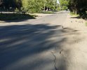 Очередной пример общего плачевнейшего состояния дорожной сети города Батайск - ямы, латки низкого качества, мятый рассыпающийся асфальт, отсутствие систем водоотвода