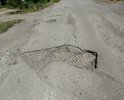 Дорога к конечной остановке общественного транспорта, состояние удручающее. Как там бедные маршрутки разворачиваются? Непонятно.
