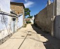 Дорожное покрытие улицы полностью отсутствует, дорога разбита, из-за ям и бугров невозможно не только проехать, но и пройти, хотя движение в этом районе достаточно интенсивное.