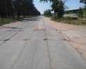 Участок дороги КПП-3 - ул. Жукова не ремонтируют уже 20 лет. Дорога по всему передана в ведение г. Улан-Удэ. "Стиральная доска". Знаков приоритета нет, недалеко и до беды.