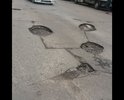 Постоянное ужасное, отвратительное состояние улицы Кутузовской. Иногда заделываются отдельные ямы, но большая часть остаётся. Доходит до такого, что это уже угрожает безопасности машин — если яму не заметишь и въедешь, легко можно лишиться колеса. Такая ситуация длится уже не первый год, но в этом году состояние дороги особенно ужасное. Даже самые крупные ямы если и заделываются, то лишь через несколько месяцев существования. На жалобы жильцов района никто не реагирует, а ситуация продолжает ухудшаться. Очень просим принять, наконец, меры.