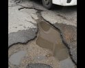 Постоянное ужасное, отвратительное состояние улицы Кутузовской. Иногда заделываются отдельные ямы, но большая часть остаётся. Доходит до такого, что это уже угрожает безопасности машин — если яму не заметишь и въедешь, легко можно лишиться колеса. Такая ситуация длится уже не первый год, но в этом году состояние дороги особенно ужасное. Даже самые крупные ямы если и заделываются, то лишь через несколько месяцев существования. На жалобы жильцов района никто не реагирует, а ситуация продолжает ухудшаться. Очень просим принять, наконец, меры.