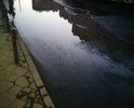 ремонт проводили на данном участке в прошлом году, нормальная дорога была ровно 2 месяца. глубина максимальная 10 см , средняя 6-7 см. 
постоянная огромная лужа . очередь утром для перехода до 30 человек. жильцы ведут детей в детские сады и школы. выбоины в месте перехода .