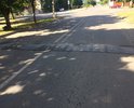 В районе дома №77отсутствует асфальтовое покрытие 2м*1,5м. 
В р-не дома №65 "лежачий полицейский"пришел в негодность, выбоины