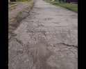 Разбитый асфальт, не видевший ремонта более 5 лет.