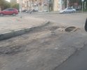 На пересечении ул. Киевская и Кирова большая выбоина, открытый частично люк и дорожное покрытие в неудовлетворительном состоянии