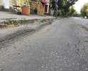 Продавленный асфальт у остановки Пушкина.