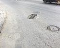 Яма, продавленная ливневка на углу Старшинова и Чкалова.
