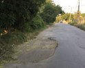 Разбитая дорога после ремонта