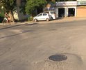 Продавленный асфальт вокруг люка