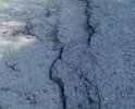Много-много ям. Со стороны улицы Интернациональной начали ремонтировать, осилили метров 50 и бросили.