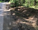 Дорога "ММК-Свитино" 818 метров на балансе Мосавтодора. Дороге нужны кюветы. Но кюветы не могут сделать, так как кюветы принадлежат лесфонду. Дорога ниже уровня грунта и поэтому ее заливает и подмывает. Дорога разваливается, а мы ходим на остановку общественного транспорта в плавь и в резиновых сапогах!  Дороге и нам - нужны кюветы!!!!