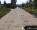 Дорога в огромных ямах, после дождя лужи по бампер.