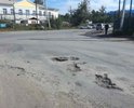 Поворот на улицу Суворова от улицы Рабочей полностью в ямах, что создает аварийную ситуацию на дороге.