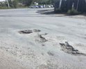 Поворот на улицу Суворова от улицы Рабочей полностью в ямах, что создает аварийную ситуацию на дороге.